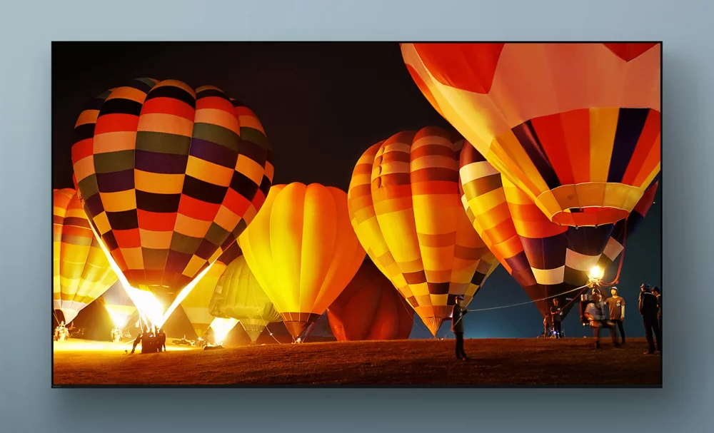 Sony X85L Full Array LED series television showing a night scene with hot-air balloons