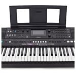 Yamaha PSR-E483 keyboard LCD screen, music rest and 61 keys close-up